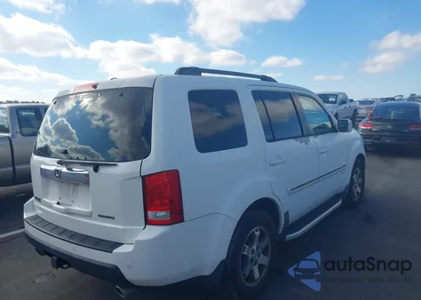 2010 Honda Pilot Touring z USA, uszkodzony, nr VIN 5FNYF3H9XAB012682